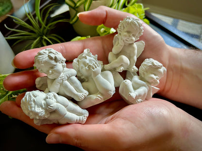 Set of Five Small Concrete Angel Statues