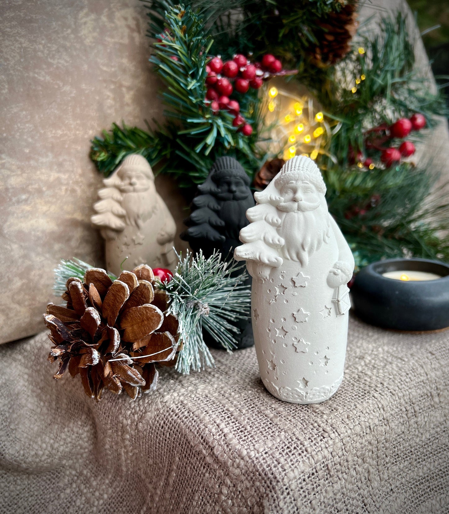 Set of Two Small Concrete Santa Claus Figurines