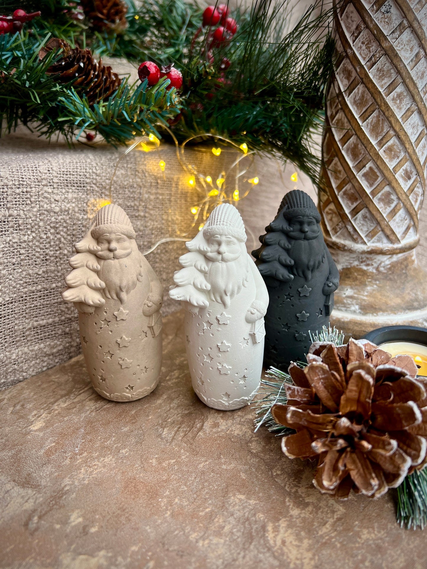 Set of Two Small Concrete Santa Claus Figurines